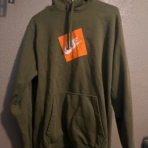 Olive green Nike hoodie.